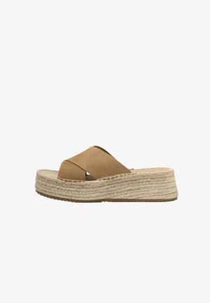 Tan suede espadrille sandals with crossed straps, jute-wrapped platform sole, and textured upper. Low-rise design with a flat rubber outsole.