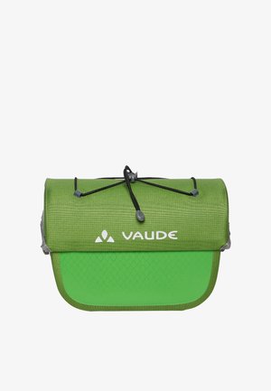 Sac roll-top vert de la marque Vaude avec fermeture à cordon noir et motif en losanges sur la partie inférieure.