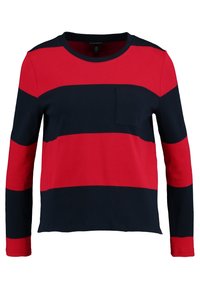 Maglietta a maniche lunghe a righe rosse e blu con scollatura rotonda e una piccola tasca sul petto; realizzata in morbido cotone.