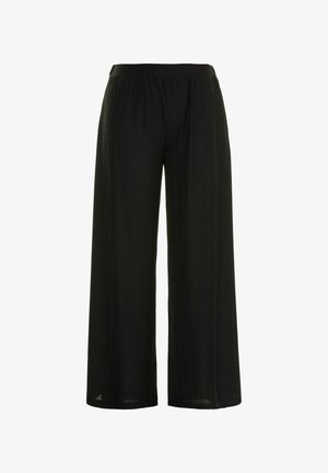 Černé široké kalhoty s měkkou, texturovanou látkou. Mají elastický pas a splývavý střih pro pohodlný pohyb.