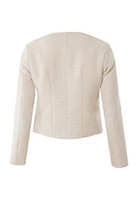 Crème textuur blazer met een getailleerde pasvorm, lange mouwen en gestructureerde naden. De stof heeft een geweven patroon en een licht verkorte lengte.