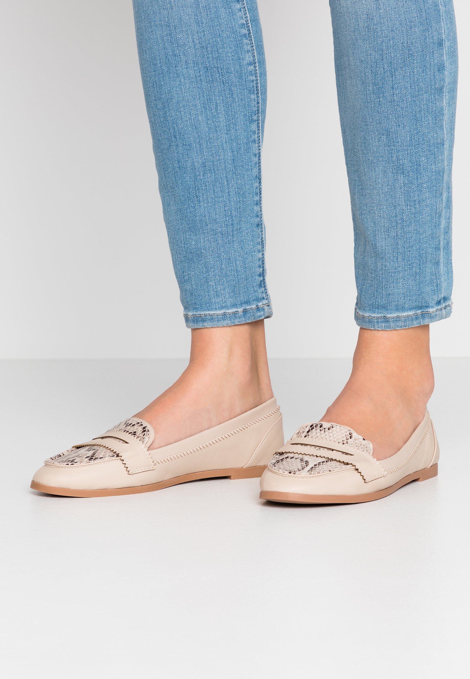 cream slip on loafers