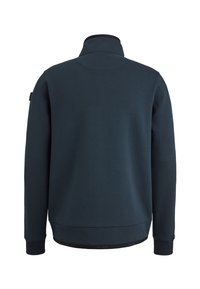 Marineblauwe sweatshirt met hoge kraag, lange mouwen en geribde manchetten. Heeft een subtiele textuur en logodetail aan de onderrand.