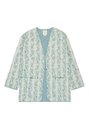 Giacca aperta con maniche lunghe di colore azzurro chiaro e bianco, con due tasche frontali e un motivo geometrico ispirato al tribale.