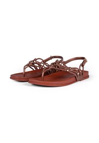 Bronzefarbene metallische Sandalen mit einem trägerdesign, flacher Sohle und strukturierten Akzenten. Verstellbarer Knöchelriemen für einen sicheren Sitz.