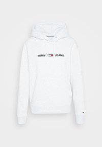 Lichtgrijze hoodie gemaakt van zachte stof, met een zak aan de voorkant, koordjes en het geborduurde "TOMMY JEANS" logo op de borst.