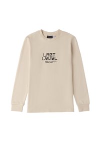 Maglietta a maniche lunghe beige in cotone con collo rotondo. Testo grafico nero centrato: "ULTIMO LIVELLO TOUR FEDELTÀ MONDIALE SKATE."