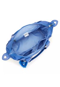 Blue fabric handbag with a zip closure, interior pockets, and soft texture. Features a charm and sturdy handles for carrying.