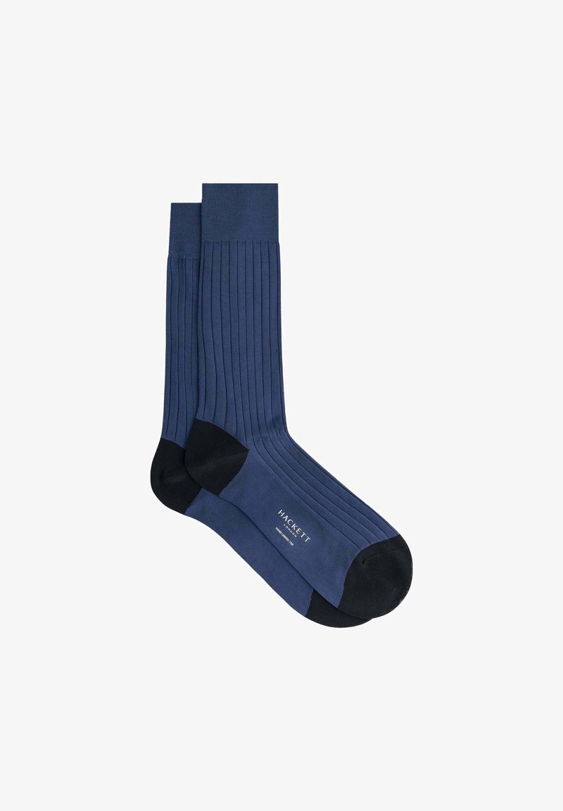 Calcetines de vestir de canalé en color azul marino, con acentos en el dedo del pie y el talón en negro. Fabricados con una tela suave, presentan una etiqueta de marca a un lado.
