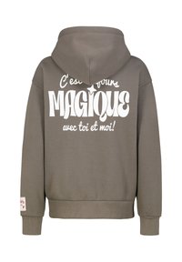 Grijze capuchontrui met opvallende witte tekst "C'est pour vous MAGIQUE avec toi et moi!" op de achterkant en geribbelde boorden.