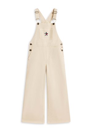 Cremefarbene, weit geschnittene Latzhosen mit verstellbaren Trägern, einer Fronttasche mit kleinem Stern-Design und Knopfdetails an den Seiten.