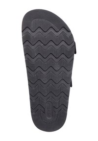 Czarna gumowa podeszwa klapka z zygzakowatym bieżnikiem zapewniającym przyczepność, gładka strefa palców oraz odcisk logo blisko pięty dla identyfikacji marki.