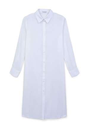 Camicia bianca a maniche lunghe con colletto, chiusura frontale con bottoni e taglio dritto. Realizzata in tessuto leggero con una superficie liscia.