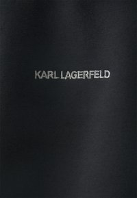 Tissu noir avec texte brodé blanc "KARL LAGERFELD" centré sur la surface.