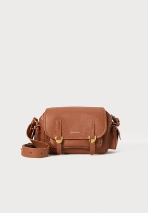 Brown leather crossbody bag with a textured finish, gold hardware accents, two front straps, and an adjustable shoulder strap.