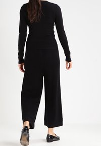 Sisley Cardigan - black