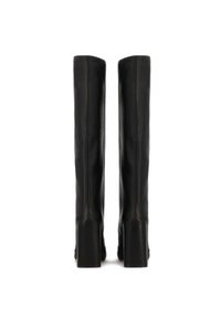 Black leather knee-high boots with a smooth texture, straight design, and chunky heels, showcasing vertical stitching along the sides.