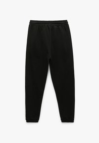 Mustat collegehousut pehmeästä materiaalista, joissa on joustava vyötärö ja ribbireunat, slim fit -muotoilu ilman näkyviä kuvioita.
