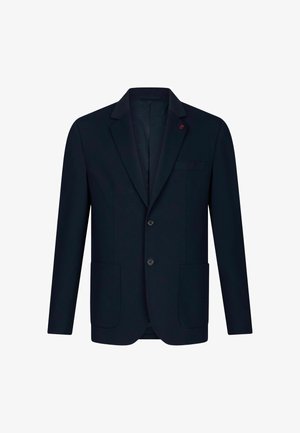 Tumesinine bleiser, mis on valmistatud siledast tekstuurist kangast. Omab lõhe kraed, kahte nuppu, rinnataskut ja kahte esistaskut.