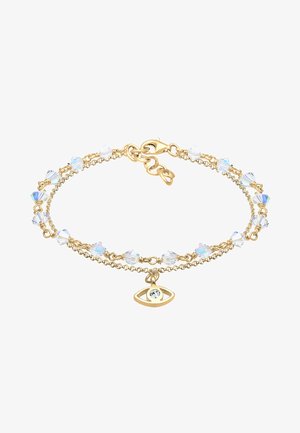 Goldene Armbandkette mit klaren Kristallperlen und einem augenförmigen Anhänger mit einem zentralen Strassstein. Verstellbarer Verschluss.