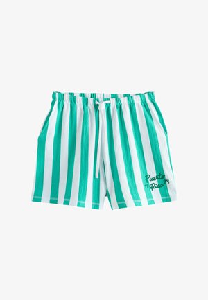 Zelené a biele vertikálne pruhované šortky s elastickým pásom, šnúrkou, bočnými vreckami a vyšitým nápisom "Puerto Rico" na pravej nohe.