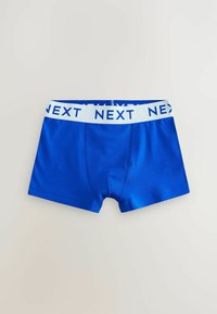 Kék pamut boxer alsónemű fehér elasztikus derékkal, amelyen kék színnel van nyomtatva a "NEXT" felirat. Sima textúra, szabott fazon.