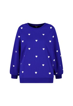 Blauwe trui met witte hartjespatronen, ronde hals en lange mouwen met elastische boorden. Zachte stof met een losse pasvorm.