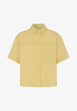 Rövid ujjú, bézs színű gombolós ing gallérral és egyetlen mellzsebbel, masszív anyagból készült.