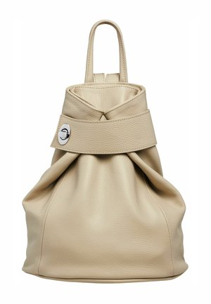 Beige leather backpack with a folded top, two short handles, and a silver clasp. The texture is soft and slightly crinkled.