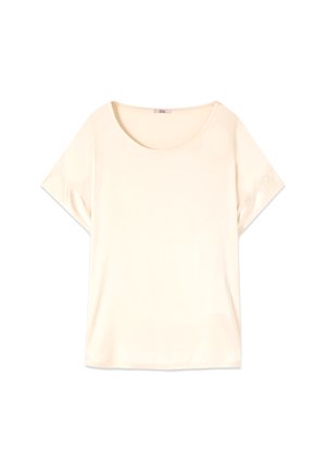 Blusa de mujer color crema de manga corta con escote redondo, colocada plana sobre un fondo blanco.