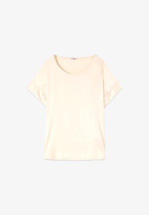 Blusa de mujer color crema de manga corta con escote redondo, colocada plana sobre un fondo blanco.
