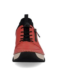 Red leather shoe with black accents, featuring a zipper on the side, round toe, and textured black sole with beige edging.