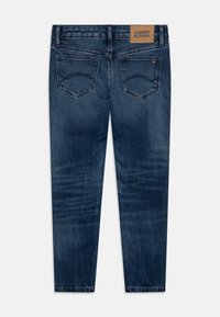 Tommy Hilfiger NORA DARK WASH - Jeans slim fit - midblue