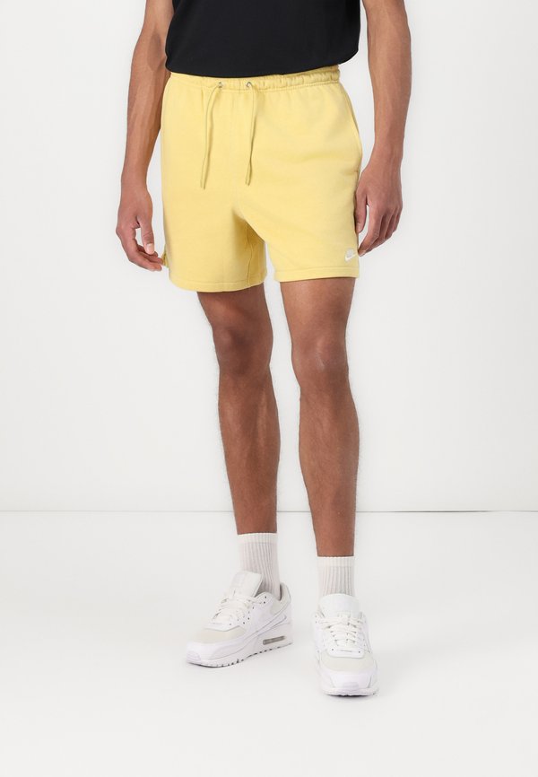 CLUB FLOW  - Tracksuit bottoms - saturn gold