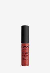 NYX Soft Matte Lip Cream in a transparent tube with a black cap. Red color with text labels, featuring a matte finish. Size: 8 mL.