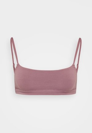 Mauve bralet wykonany z miękkiego, elastycznego materiału z regulowanymi ramiączkami, bezszwowymi krawędziami i bez wyściółki dla komfortu i wsparcia.