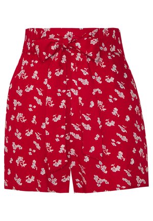 Shorts floraux rouges en tissu léger avec un lien à la taille, ornés de motifs floraux blancs et bleu clair.
