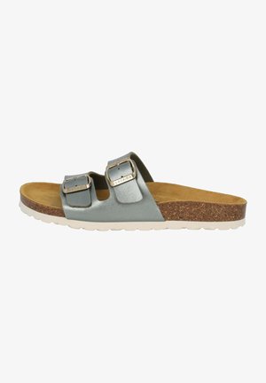 Sandalias tipo slide de cuero azul con dos hebillas ajustables, plantilla de corcho y suela de goma blanca. Textura lisa con un diseño moderno.