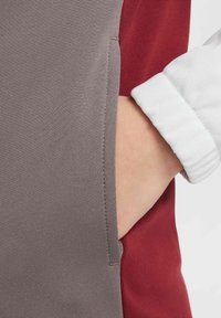 Nike Sportswear SPORTSWEAR - Trenirka - team red cave stone photon dust white