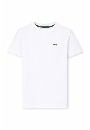 Witte T-shirt met korte mouwen en ronde hals met klein groen krokodillenlogo op de linkerborst tegen een effen witte achtergrond.