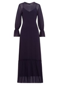 Robe longue, violet foncé, avec des manches longues transparentes, un corsage ajusté et une jupe à volants. Elle présente un col rond et une fermeture éclair dans le dos.