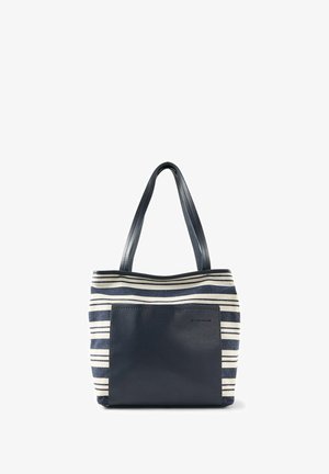Borsa a righe blu navy e bianca con due lunghi manici in pelle e una tasca frontale blu navy solida.
