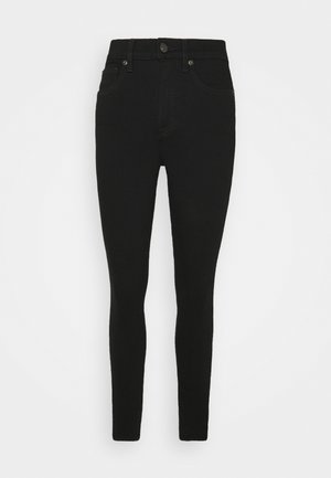 Zwarte skinny jeans van denim, met een hoge taille, vijf zakken en een knoopsluiting. Soepele textuur met subtiele stiksel details.