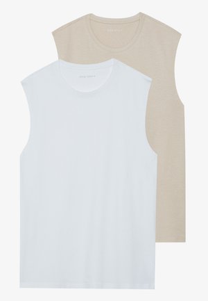 Two sleeveless shirts: one white, one light beige. Both have crew necklines and are made of soft, smooth fabric with a casual fit.