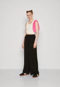 Vero Moda Tall VMALVA WIDE - Trousers - black