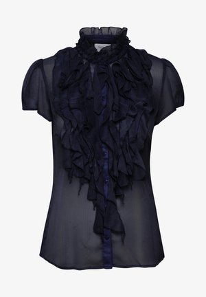 Tmavomodrá blúzka z priesvitného materiálu s volánovým dizajnom. Má vysoký golier a krátke rukávy, s zapínaním na gombíky a jemným leskom.
