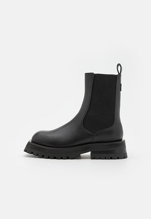 RIANNE - Plateaustiefelette - black