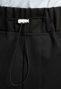 DEF Housut - black