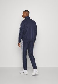 Sergio Tacchini DORALTRACKSUIT Tracksuit navy/white/dark blue