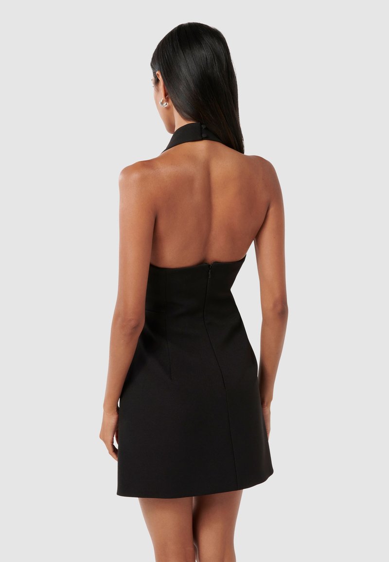 black halter cocktail dress knee length Zapaka Women Black Glitter Short Cocktail Dress Halter Open Back Party Dress With Tassel, Black / M